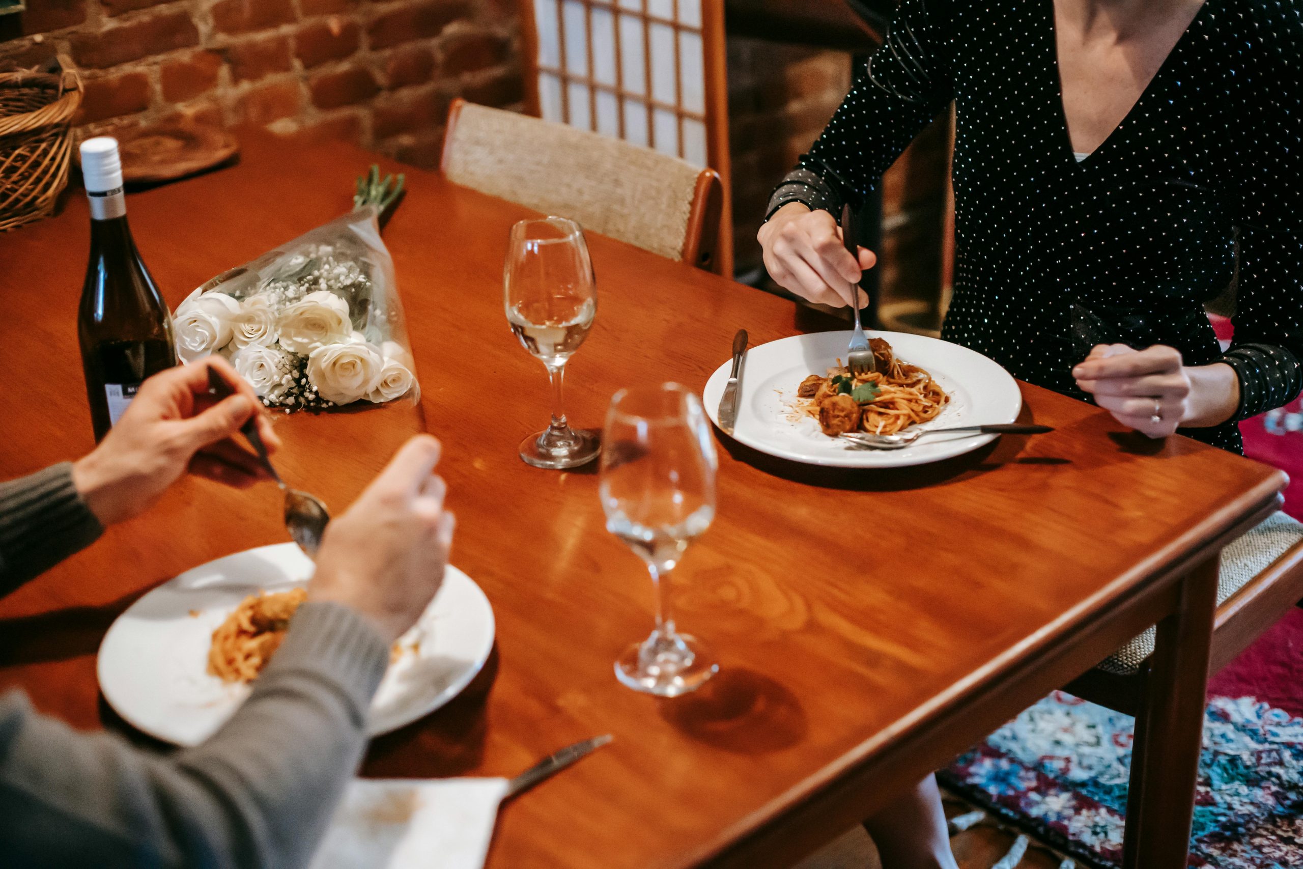 Plates with Pasta on a Wooden Table